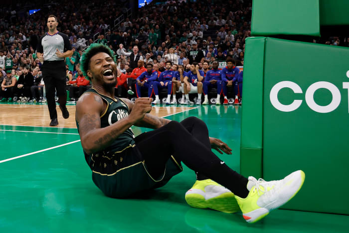 Marcus Smart smiles after being fouled.
